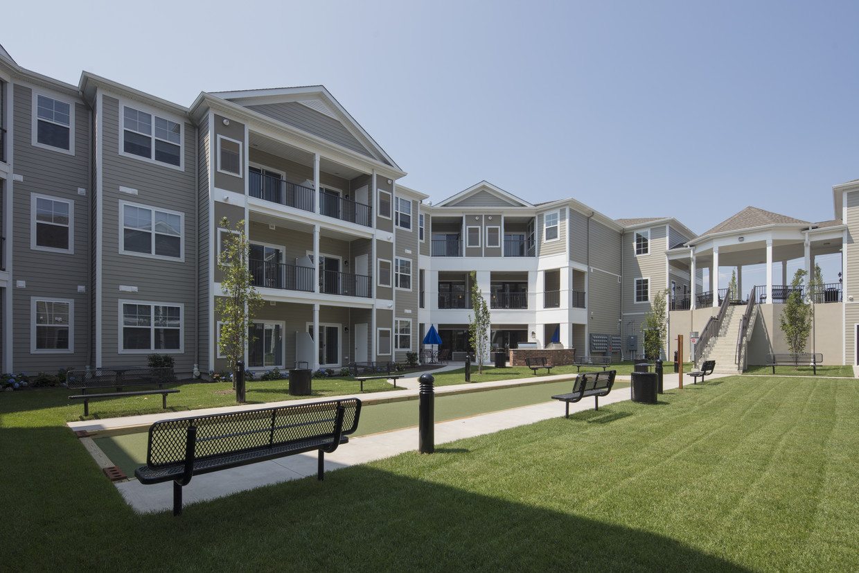 Courtyard with Bocce Court - Cornerstone at Toms River (55+)