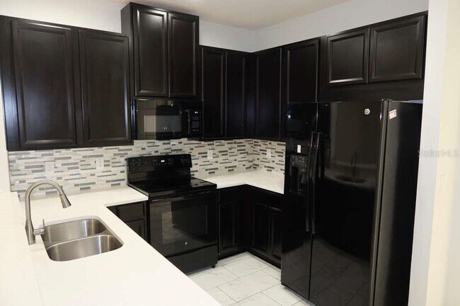 Building Photo - 7011 White Treetop Pl