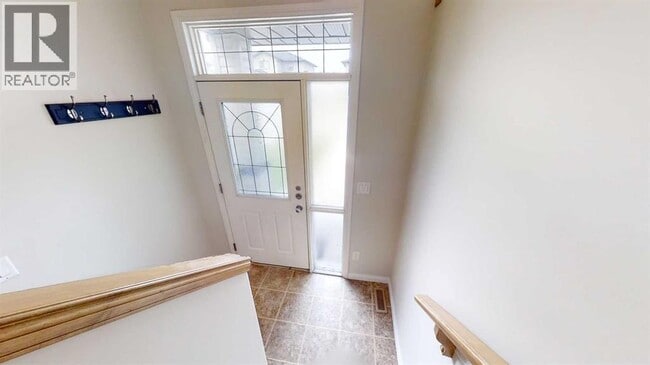 Building Photo - 9061-9131 131 Ave