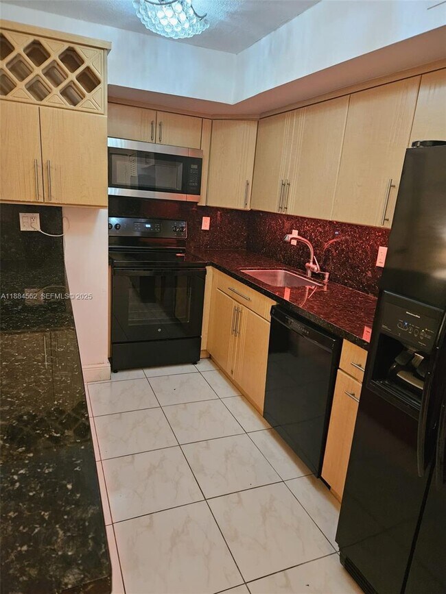 Building Photo - 8425 Harding Ave