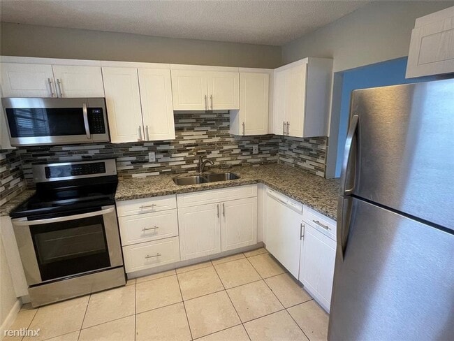 Building Photo - 3 br, 2 bath House - 5420 SW 25th Ave