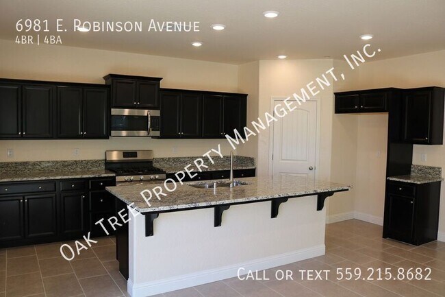 Foto del edificio - 6981 E Robinson Ave