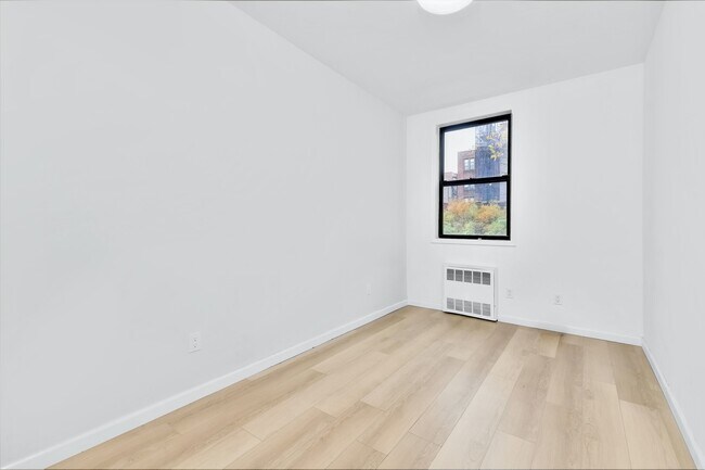 Building Photo - Soho/Village Border Renovated 2BR Home