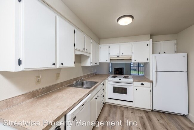 Building Photo - 10825 SW Garden Park Pl