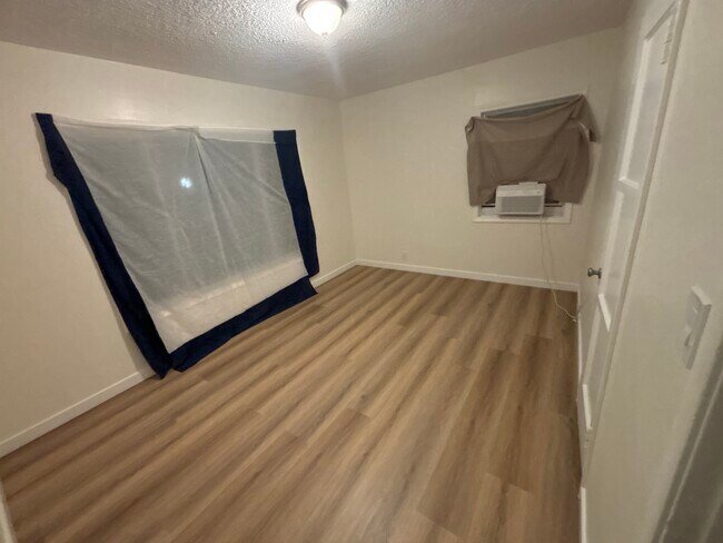 Main bedroom w/ street view - 11420 Mina Ave