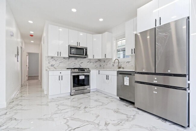 Foto del edificio - 133 W 4TH St