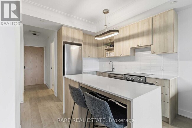 Building Photo - 50 George Butchart Dr