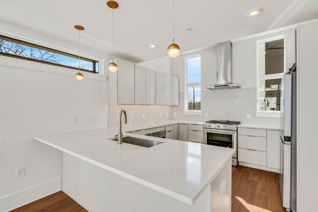 Building Photo - First month FREE! Spacious new downtown to...