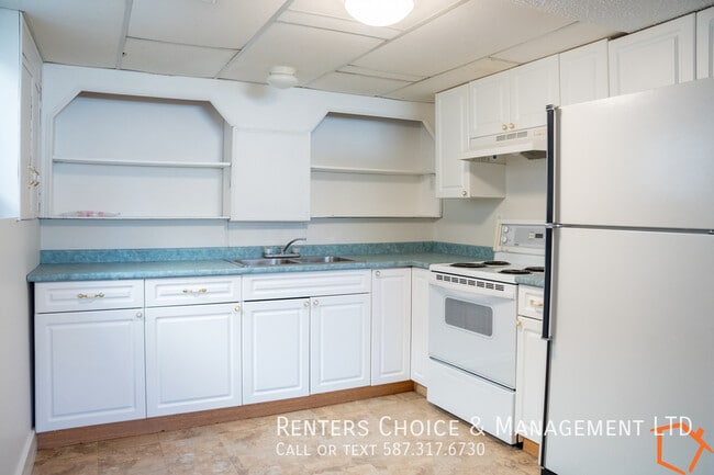 Building Photo - Basement Suite With Assigned Parking, BONU...