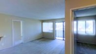 This single-floor space offers a straightforward and functional layout designed for comfortable everyday living. The main living area is the focal point of the space, characterized by its open feel and abundance of natural light. Large windows, dressed with vertical blinds, allow generous daylight to filter in while offering privacy and light control. The room features neutral-toned walls that complement the light-colored hard flooring, creating a clean and cohesive aesthetic throughout. The smooth, flat ceiling adds to the airy quality of the space, while the light wall tones keep the interior feeling bright and welcoming. The layout appears unobstructed, providing flexibility for a variety of furniture arrangements. A doorway visible at the edge of the main area suggests additional rooms or storage beyond, contributing to the overall functionality of the floor plan. The overall ambiance is calm and understated, with a neutral palette that serves as a versatile backdrop for personalization. This space is well-suited for those who appreciate simplicity, natural light, and an open, easy-to-navigate layout on a single level.
