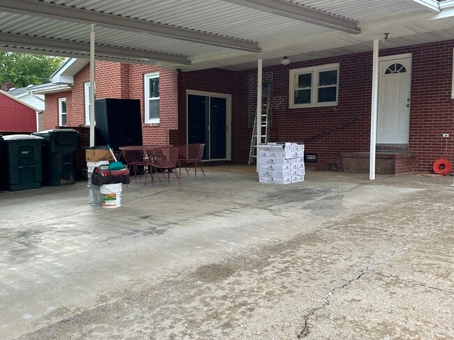 Covered Porch and 3 Car Carport - 107 Idletime Dr