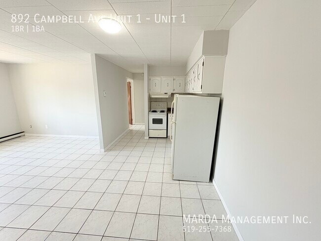 Building Photo - COZY 1 BED/1 BATH MAIN FLOOR -CLOSE TO U OF W + HYDRO! 1/2 MON FREE!