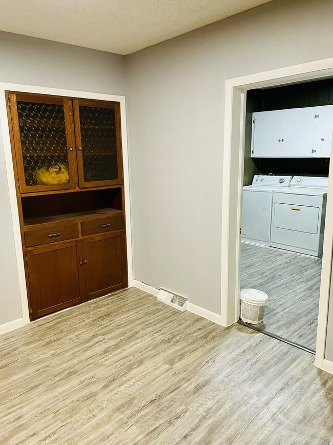 Plenty of cabinets. Laundry room has plenty of space. - 502 N Jennings Ave