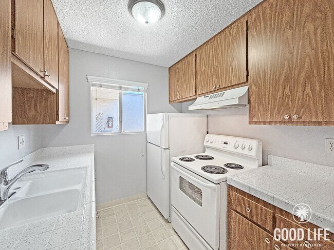 Foto del edificio - Comfortable 1BD/1BA Upper-Level Condo in North Park with Reserved Parking & On-Site Laundry
