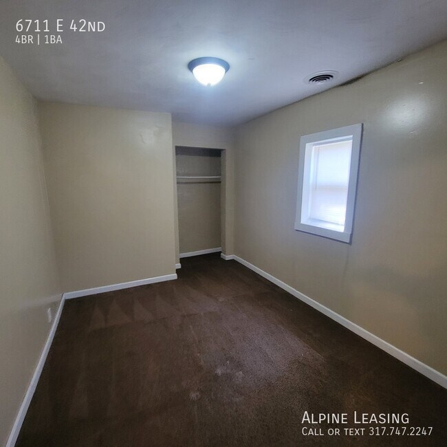 Building Photo - 6711 E 42nd-