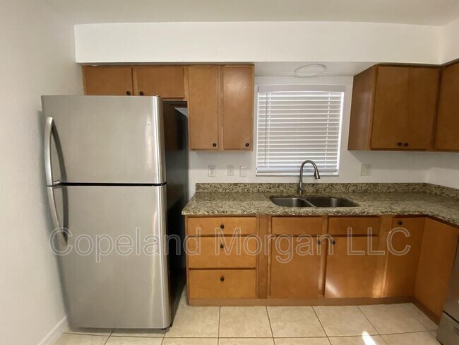 Building Photo - 5613 E 127th Ave