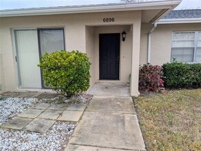 Building Photo - 6896 W Country Club Ln