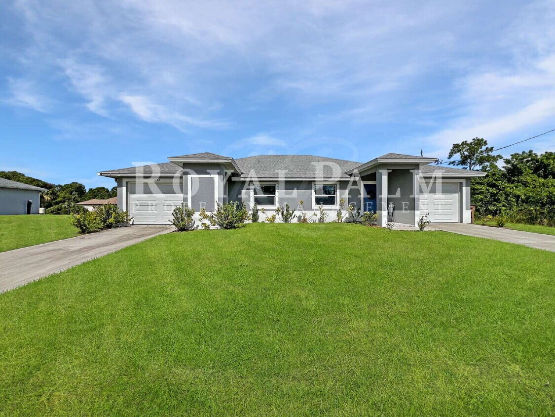 Primary Photo - Move-In Special! Half Month FREE – APPLY by December 15th – Modern 3BR/2BA Duplex in Lehigh Acres...