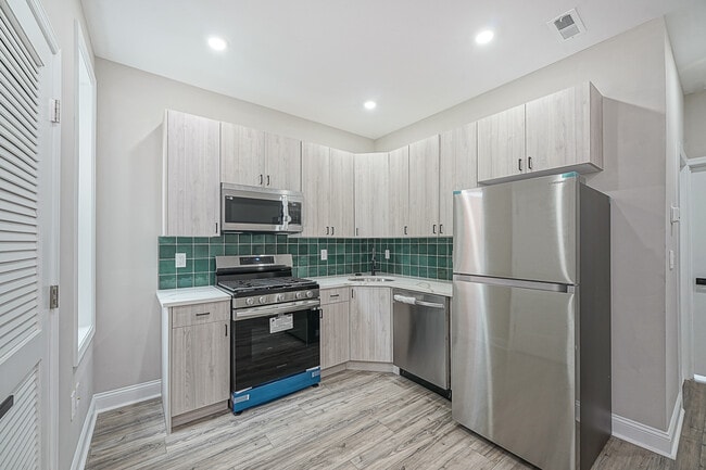 Building Photo - 5116 Delancey St