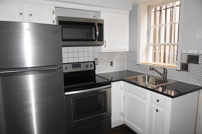 Foto del edificio - Must-see 1 Bedroom Townhome with Den - Rid...