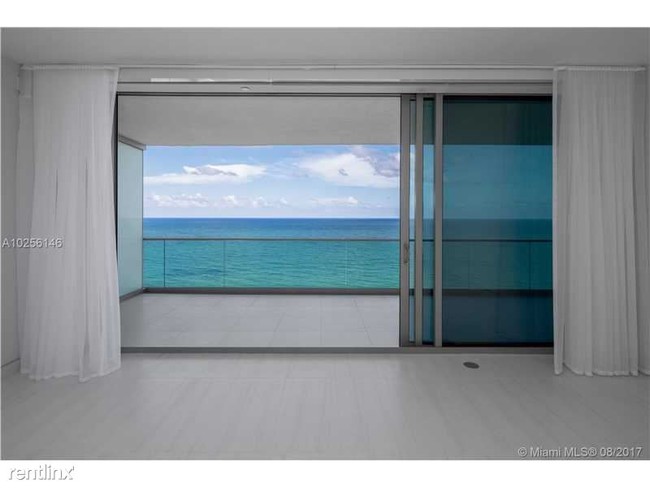 Building Photo - 10201 Collins Ave
