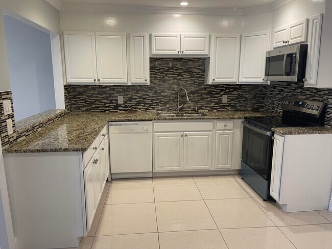 Foto del edificio - 8958 SE Hobe Ridge Ave