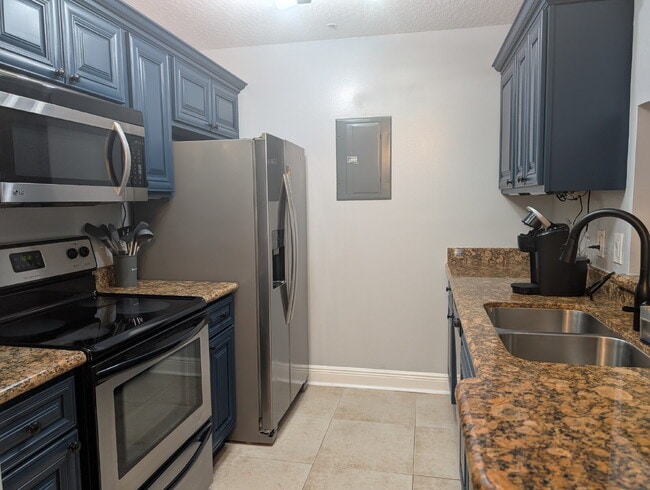 Building Photo - Absolutely Stunning Upgraded and FURNISHED...