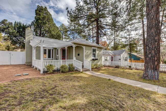 Building Photo - Complete With White Pickett Fence!