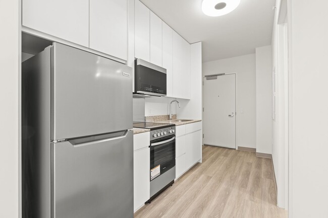Building Photo - Brand New Studio at The Flats at Sky Ala M...