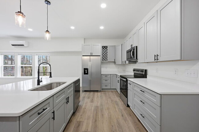 Building Photo - Stunning lakeside new construction: 4 bedroom and 3 bath home