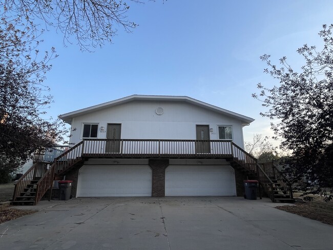 The unit for rent (3003) is the left side of the duplex - 3003 Sequoia Dr