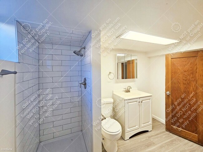 Building Photo - 2 br, 1 bath Duplex - 4300 S Acoma St