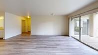 Located at 1175 Lake Blvd in Davis, California, this single-floor residence offers 2 bedrooms, 3 bathrooms, and a well-organized layout designed for comfortable everyday living. Wood-look luxury vinyl flooring runs consistently throughout the home, lending a clean, cohesive aesthetic to every room.

The kitchen is a functional highlight, featuring white cabinetry, light countertops, and stainless steel appliances including a range, microwave, and refrigerator. A black dishwasher and a window allowing natural light complete the space. The kitchen opens seamlessly into the living room, which is generously sized and brightened by a large sliding glass door and a ceiling fan overhead.

The spacious primary bedroom offers ample room for furnishings and is served by dedicated closet space. The second bedroom is well-proportioned with a large window that invites natural light. Two closets throughout the unit provide added storage convenience.

All three bathrooms are finished with light, neutral tones. The bathrooms feature white vanity cabinetry with light countertops, wood-look flooring, and at least one walk-in shower with a gold-framed glass enclosure and grab bars, indicating accessibility-conscious design. A connecting hallway ties the layout together efficiently, creating smooth flow between the living spaces and private quarters.