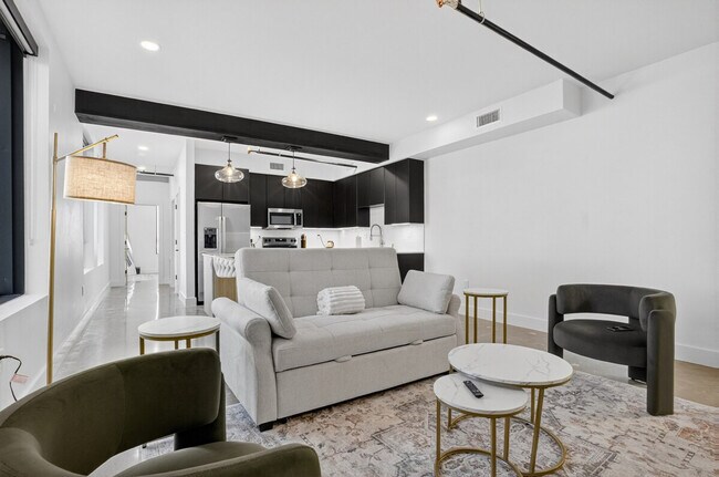 Foto del edificio - 116 W 3rd St