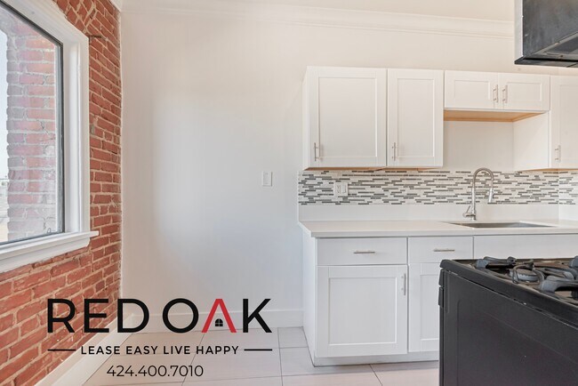 Foto del edificio - Sun-Drenched Studio with Stainless Steel A...