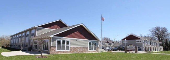 Building Photo - Whispering Echoes Townhomes