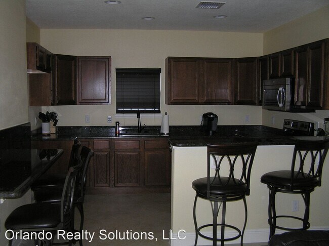 Foto del edificio - 9329 Winter Garden Vineland Rd