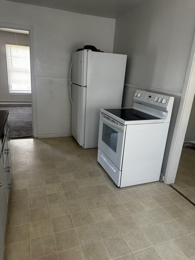 Kitchen includes refrigerator and stove - 608 Xenia St