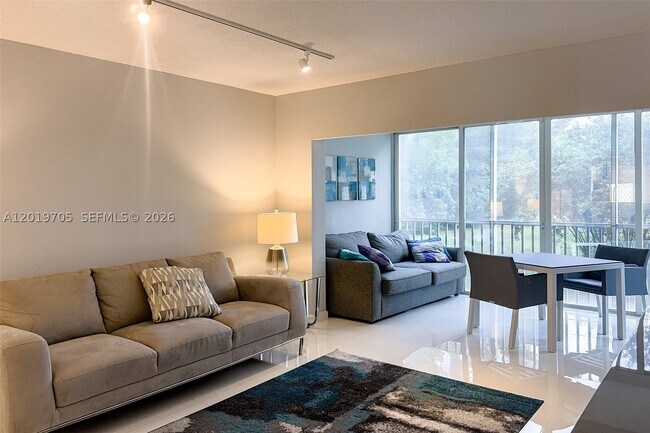 Building Photo - 3200 N Palm Aire Dr