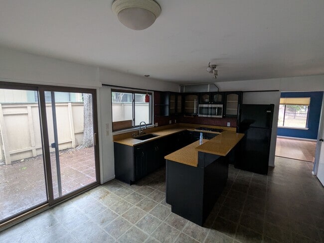 Kitchen and patio - 9515 Blue Creek Ln