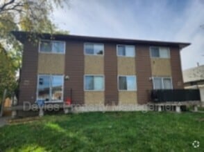 Building Photo - 7115-7180 80 Ave NW