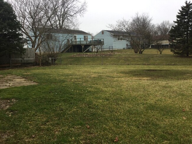 Building Photo - Apply Now for Half Off Rent!