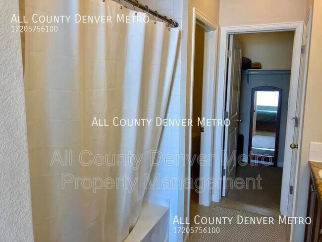 Photo - 16285 W 62nd Ln Townhome