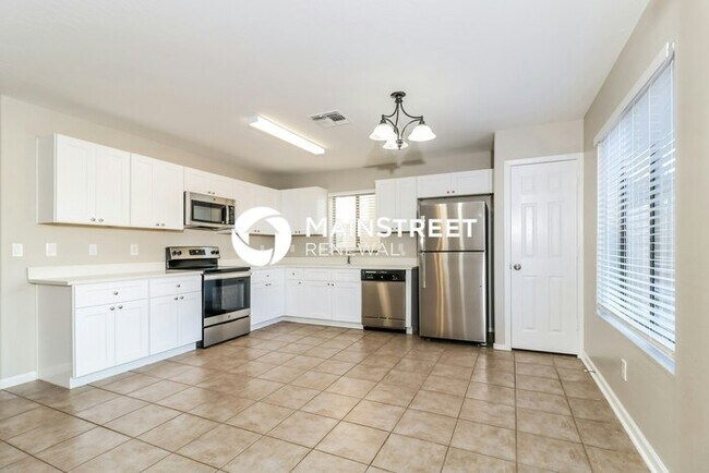 Building Photo - 4 Bedroom Pet-Friendly Home in Avondale, AZ with Main Street Renewal