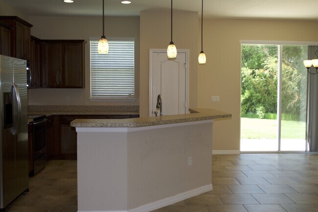 Building Photo - The Villas at Tucker Oaks