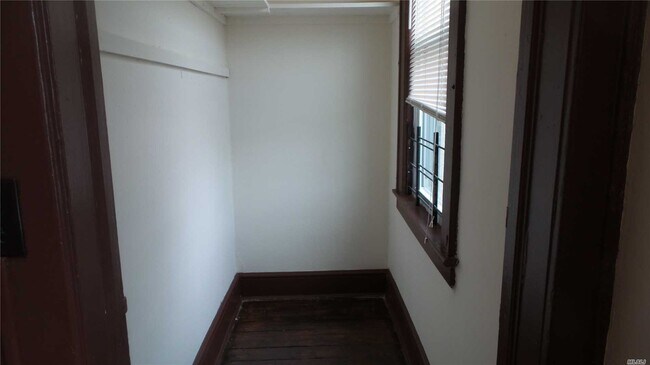 Building Photo - 18-06 120th St