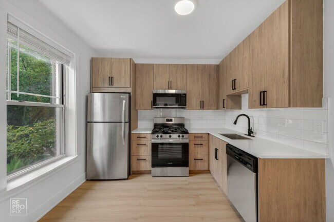 Foto del edificio - 6967 N Bell Ave