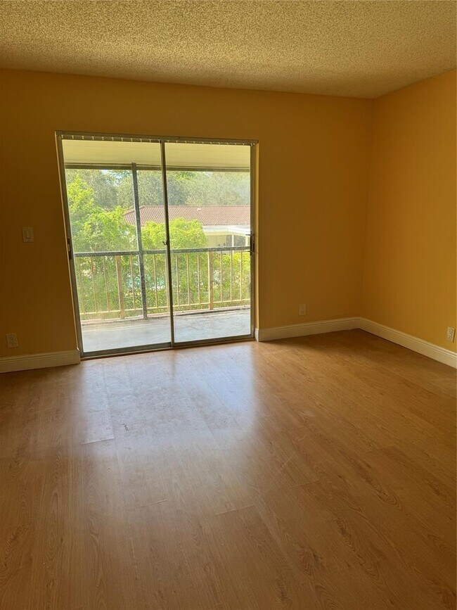Building Photo - 3200 Coral Springs Dr