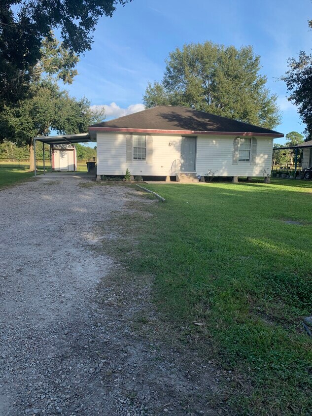 Front view from road - 127 W Menard Rd