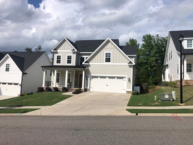 View of the side of house to the fenced in backyard. - 5214 Teal Ln